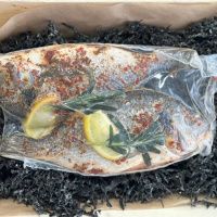 Дорада в оливковом масле с травами